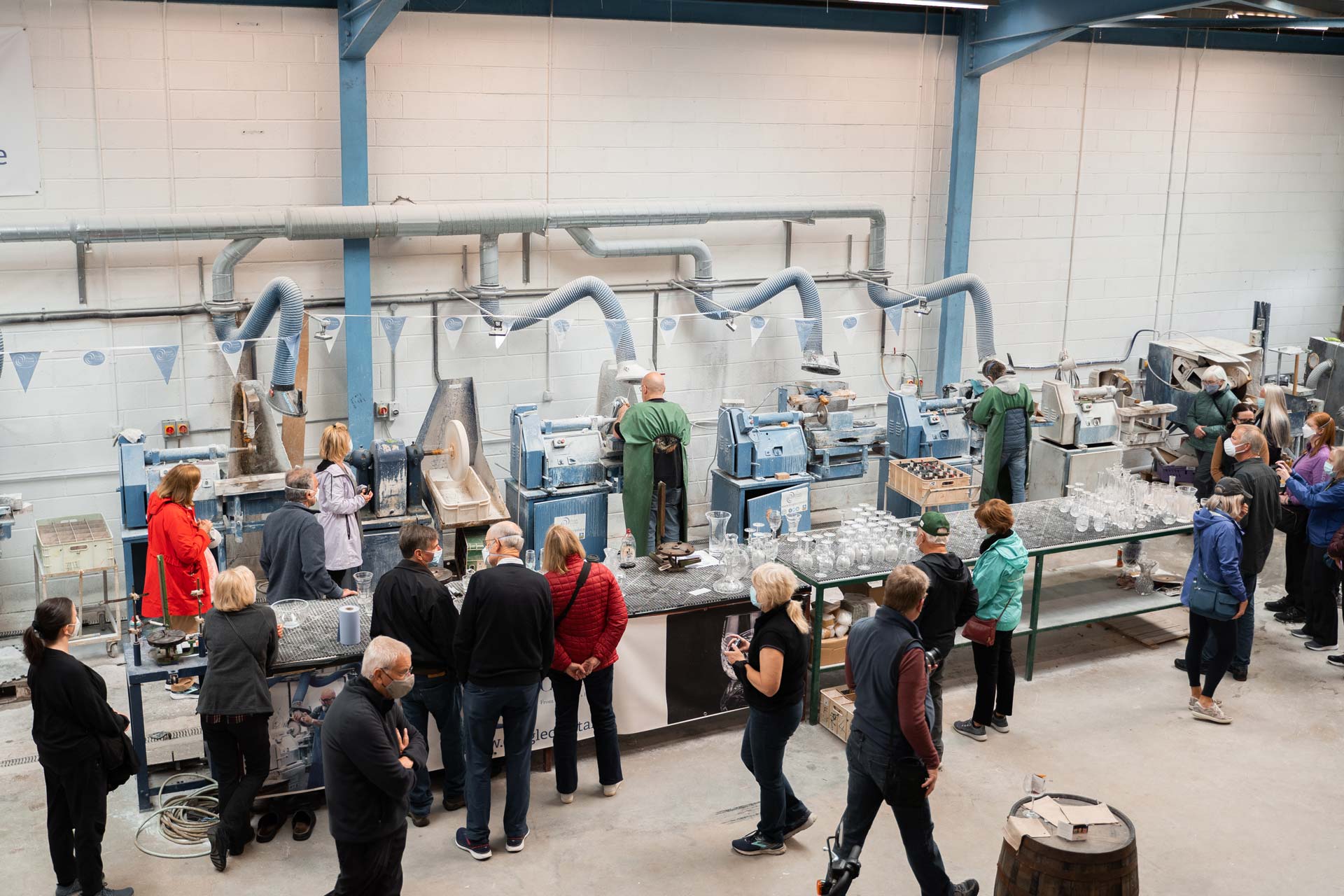 A tour group looking around the workshop